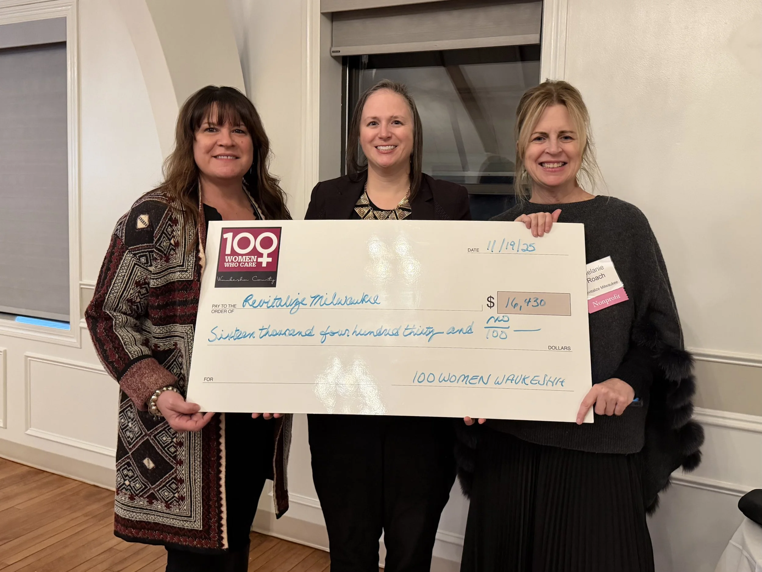 Recipient Revitalize Milwaukee Check Presentation