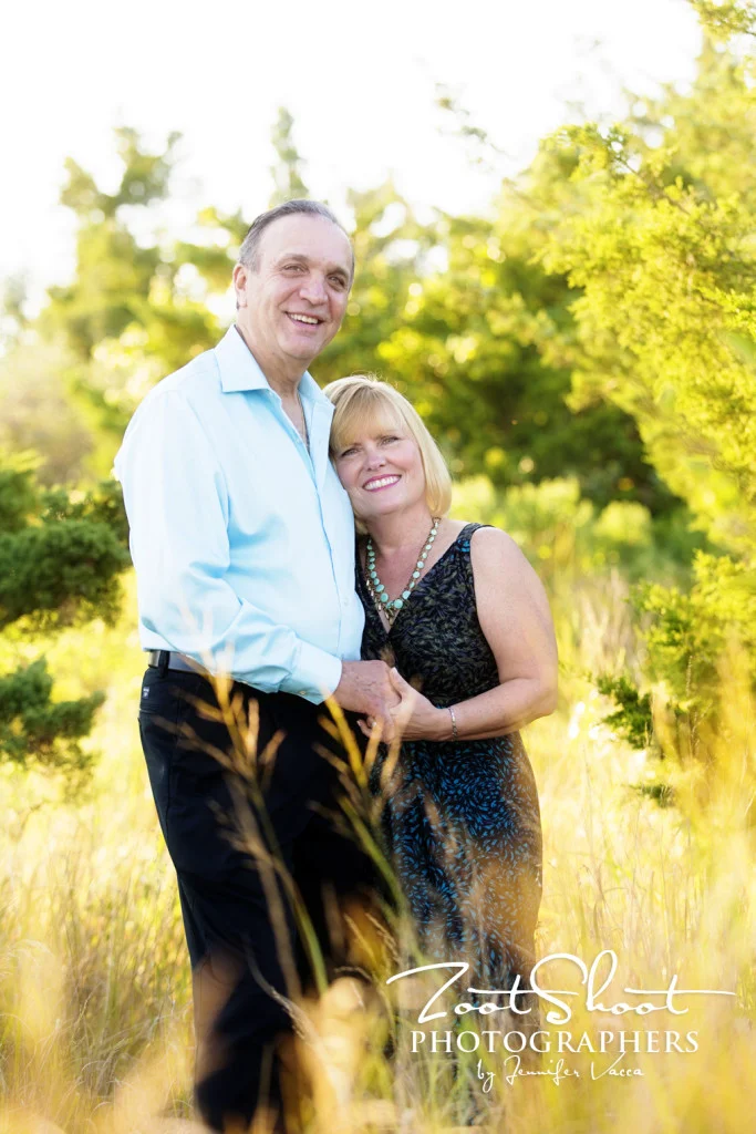 Loving couple having fun for their anniversary photoshoot at Crab Meadow Beach