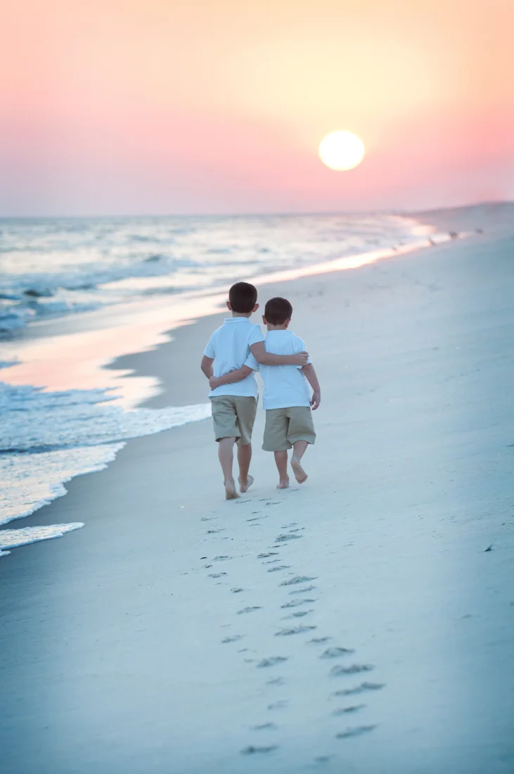 Brothers photoshoot walking on the beach at Robert moses State Park