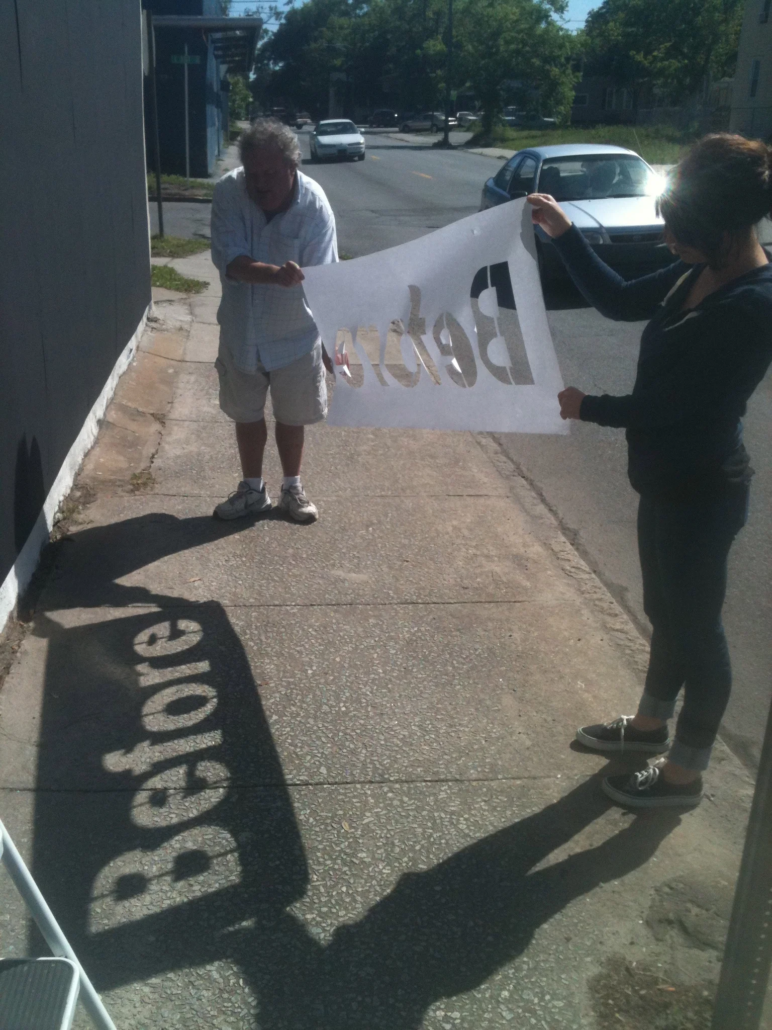 Francis Allen and Megan Luther installing the template at 31st and Waters.