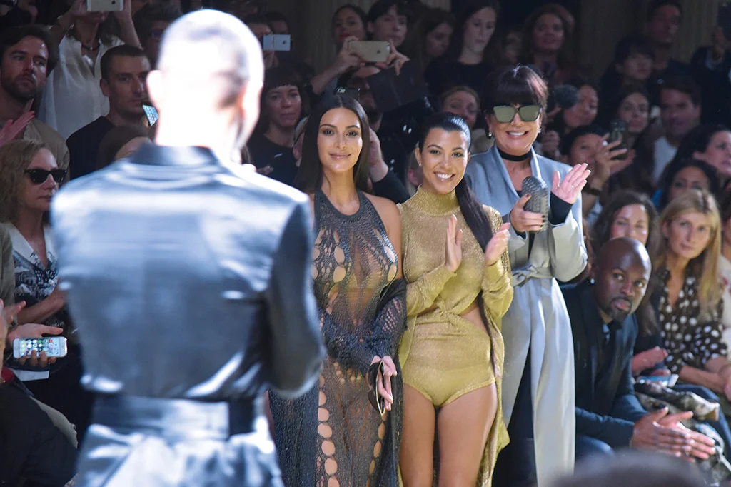 Keeping in with the Kardashians Kim, Kourtney and Kris Jenner applaud the Spring 2017 show. MAIN IMAGE, TOP Olivier Rousteing accompanied by Julia Frauche, a model