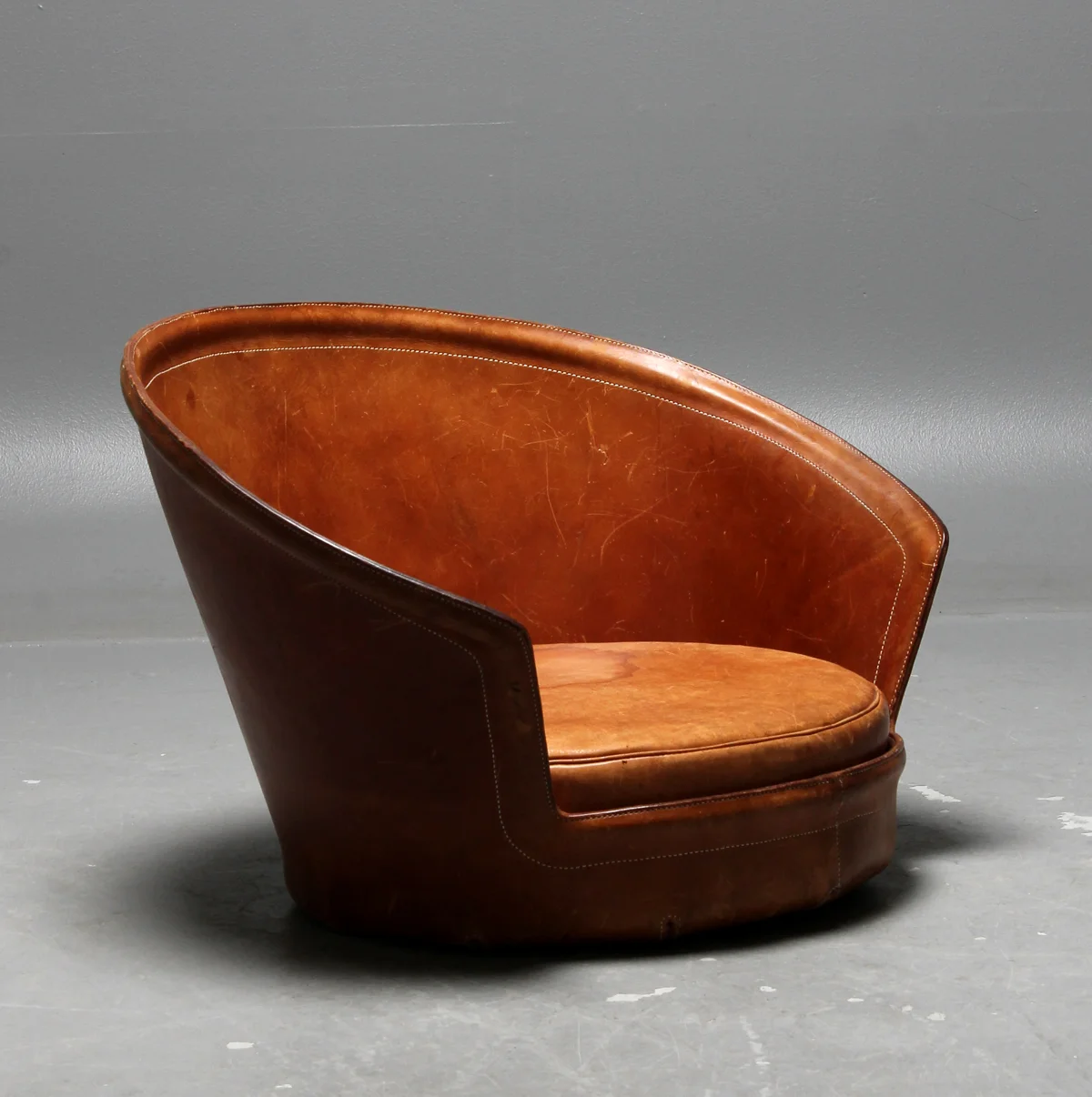 'Fireplace Chair', designed by Ole Gjerløv-Knudsen (1930-2009), circa 1959. Produced by master saddle maker Willy Hendriksen at Brdr. F. & L. Dahlmans Eftr.