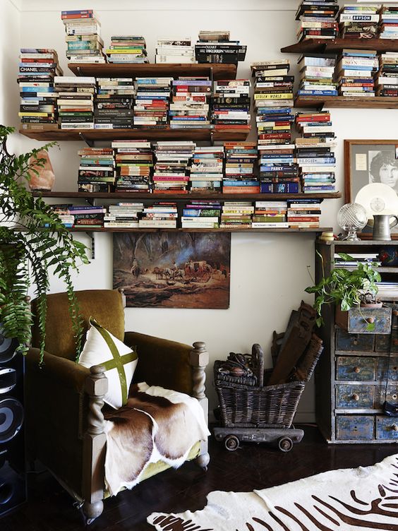 Books on a shelf on a wall