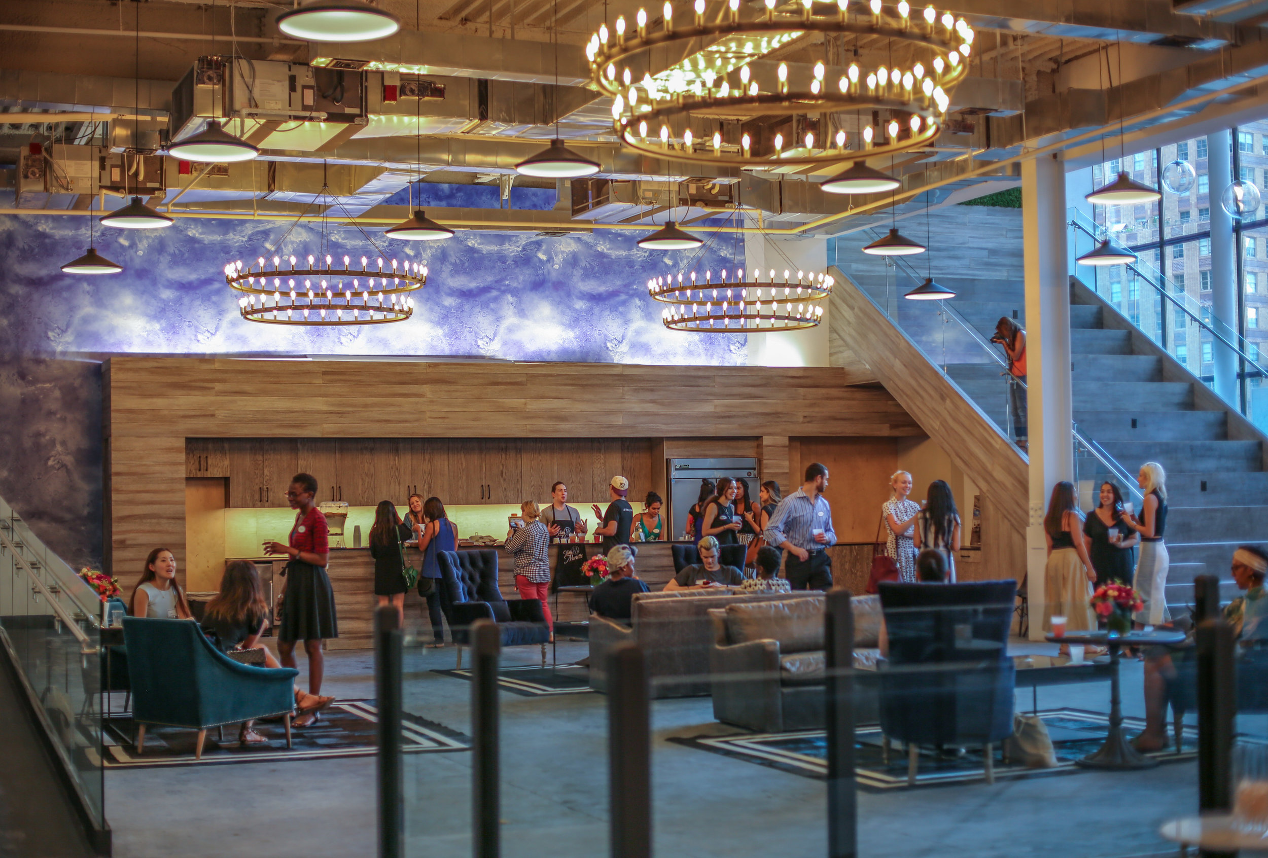 People congregating in the Mezzanine Kitchen