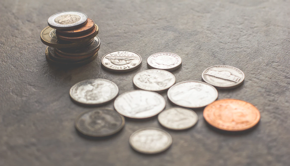 Coins on a gray surface