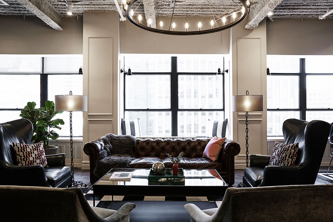 Professional-looking coworking space with leather sofas