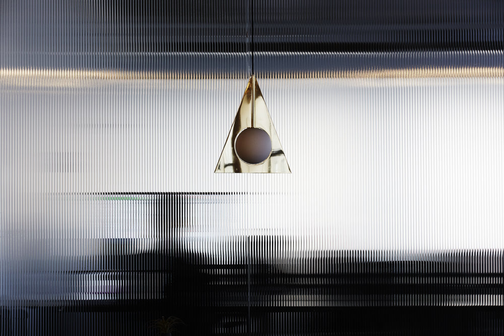 Light fixture in a shared office space