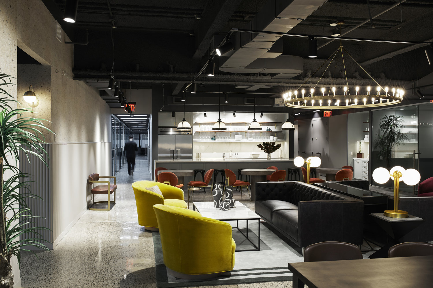 modern open office with kitchen and other functional areas