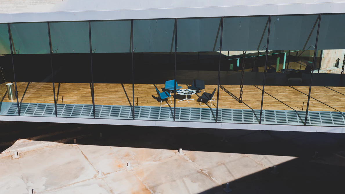 view from above of large open office plan area with a coffee table and chairs