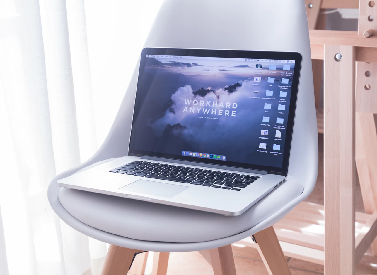 office chair with open laptop that can be used to plan an office move.png