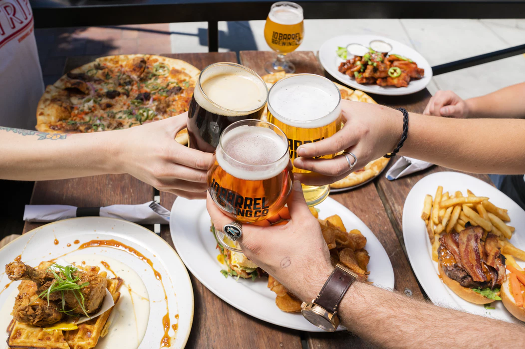 employees enjoying food and drinks