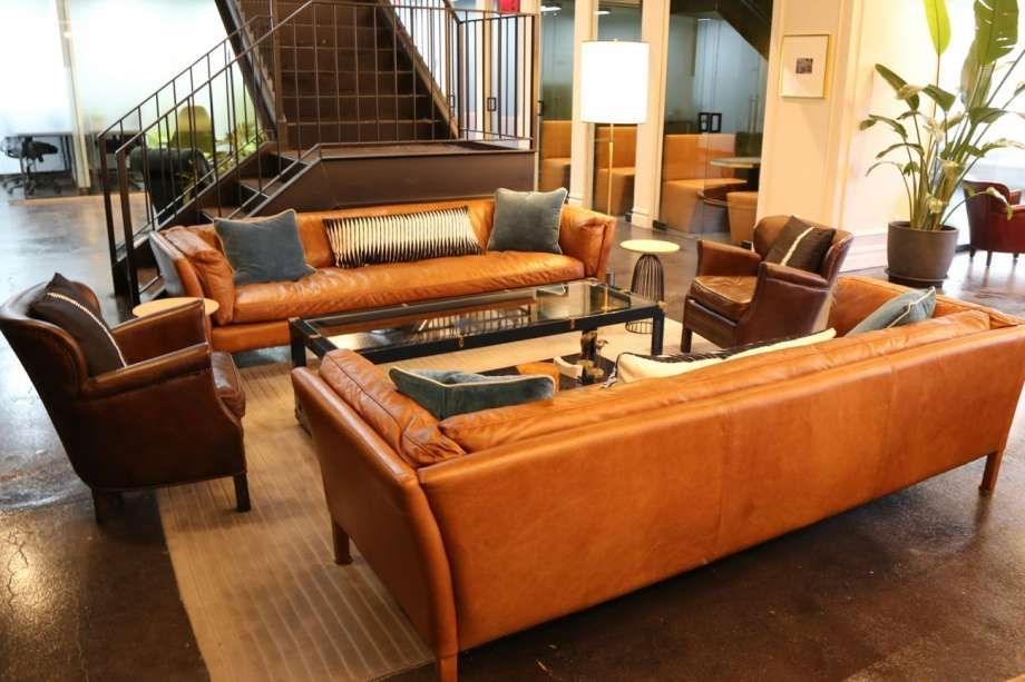 Orange sofas in a lounge area