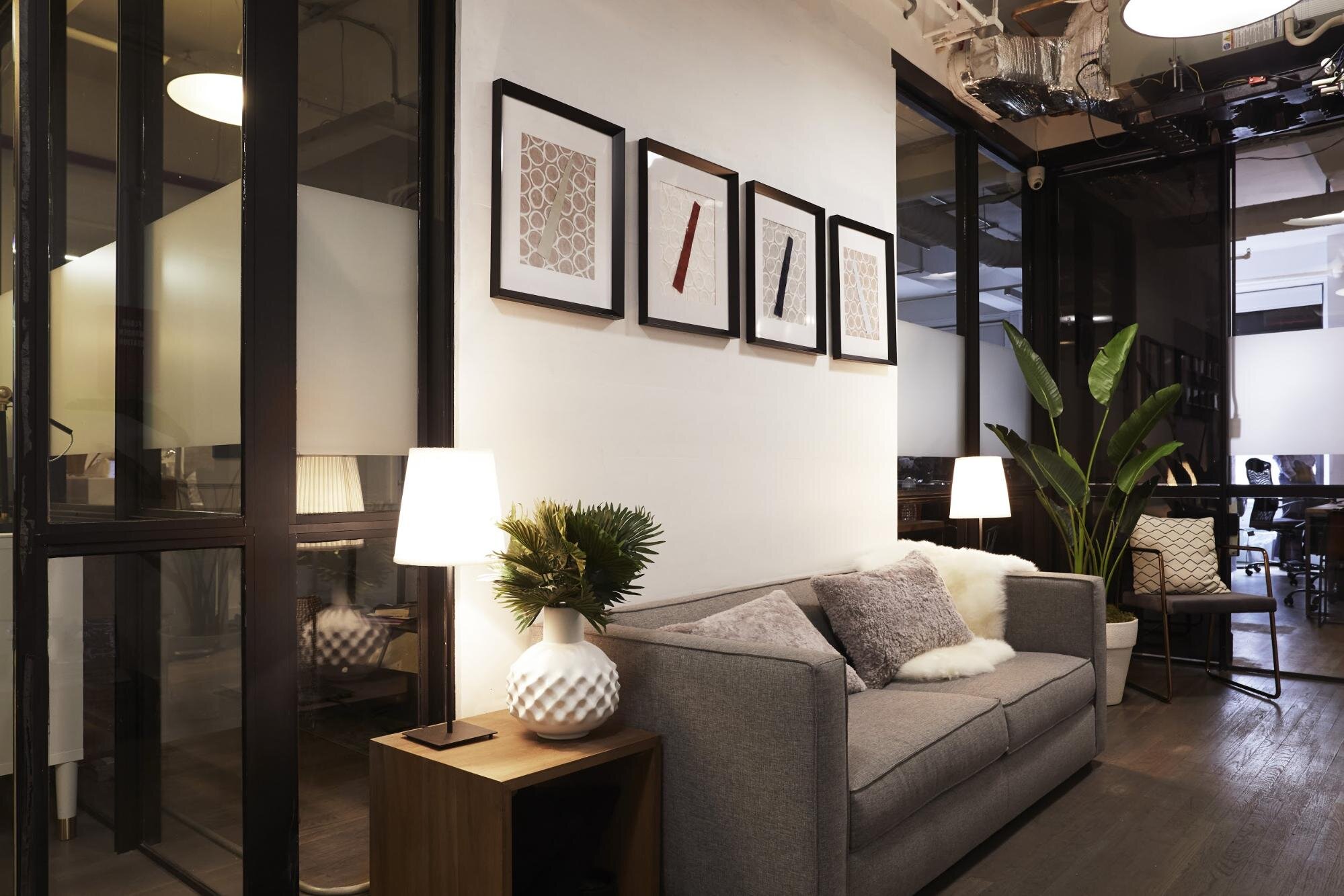 Comfy gray sofa in a Bond Collective flexible office space