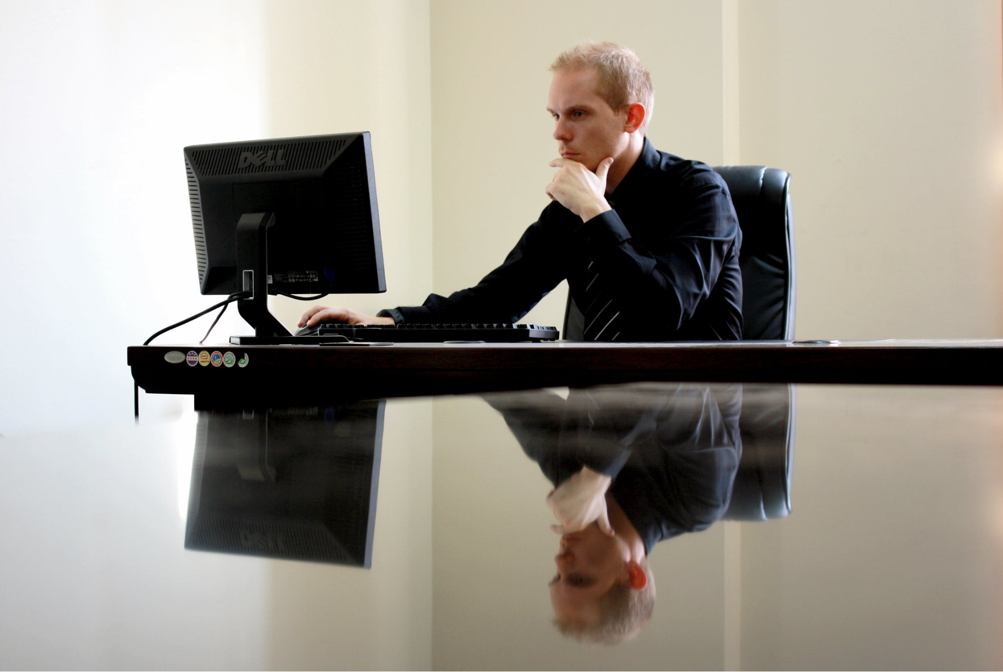 Man working in a quiet space in collaborative workspace