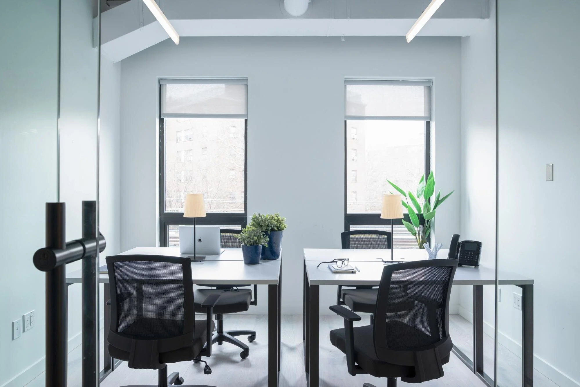 flexible office space with two desks room for four people