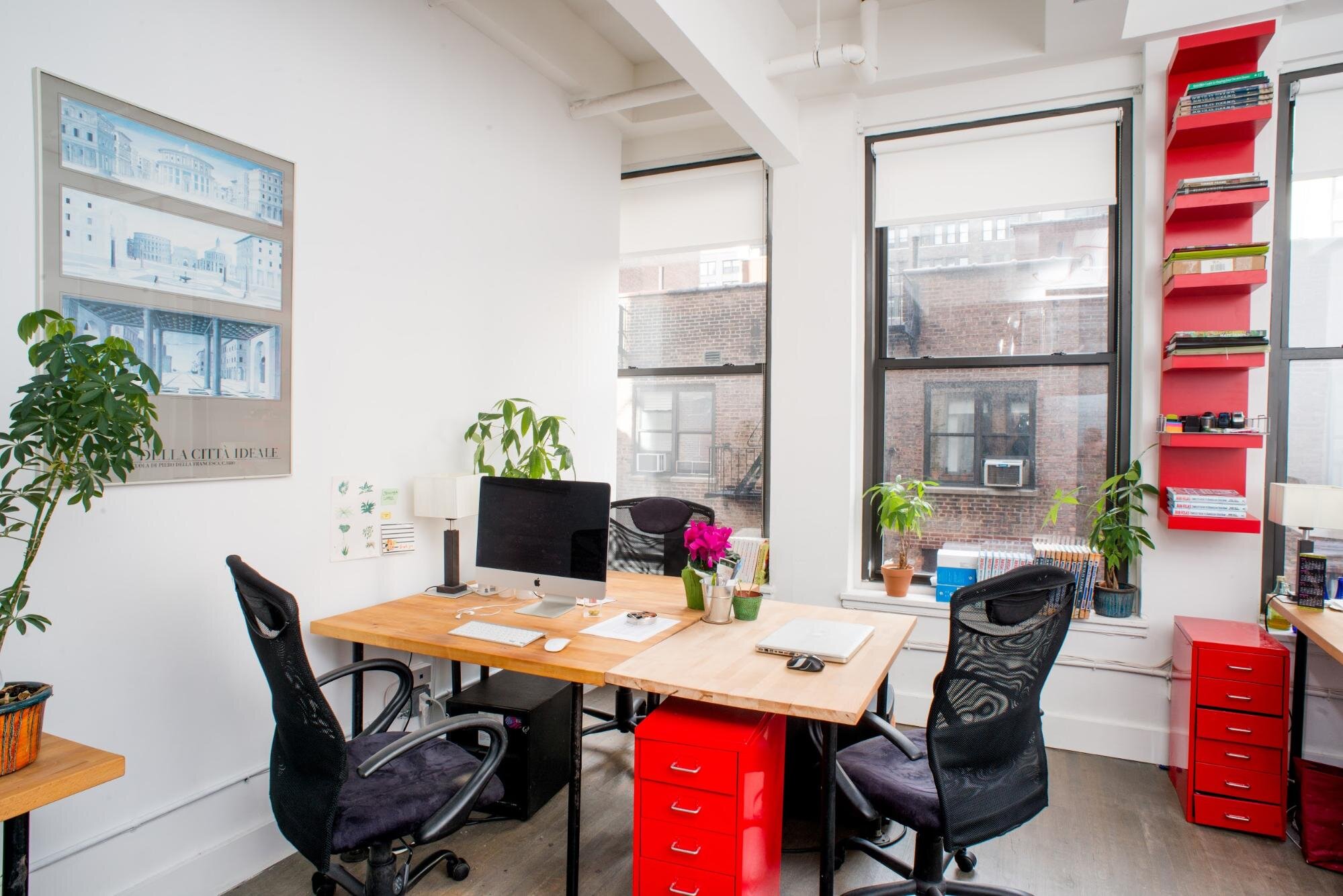 Inside a small office with a shared desk