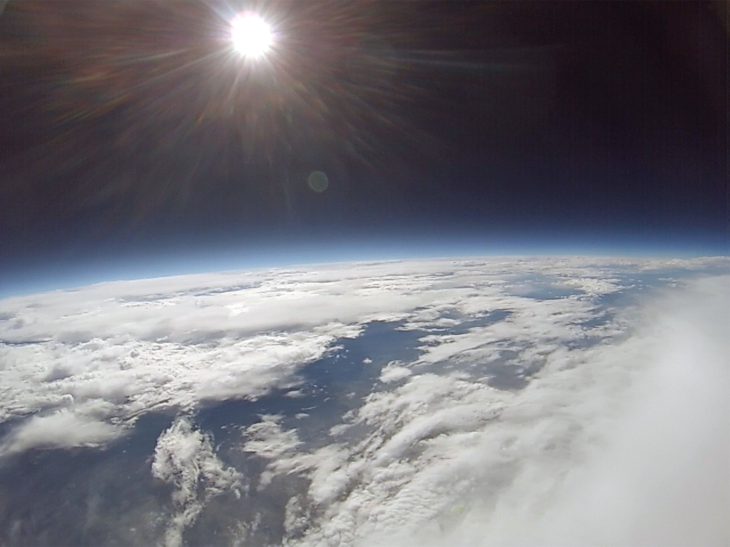 A frame grabbed from the GoPro video from an altitude of around 50,000 feet.