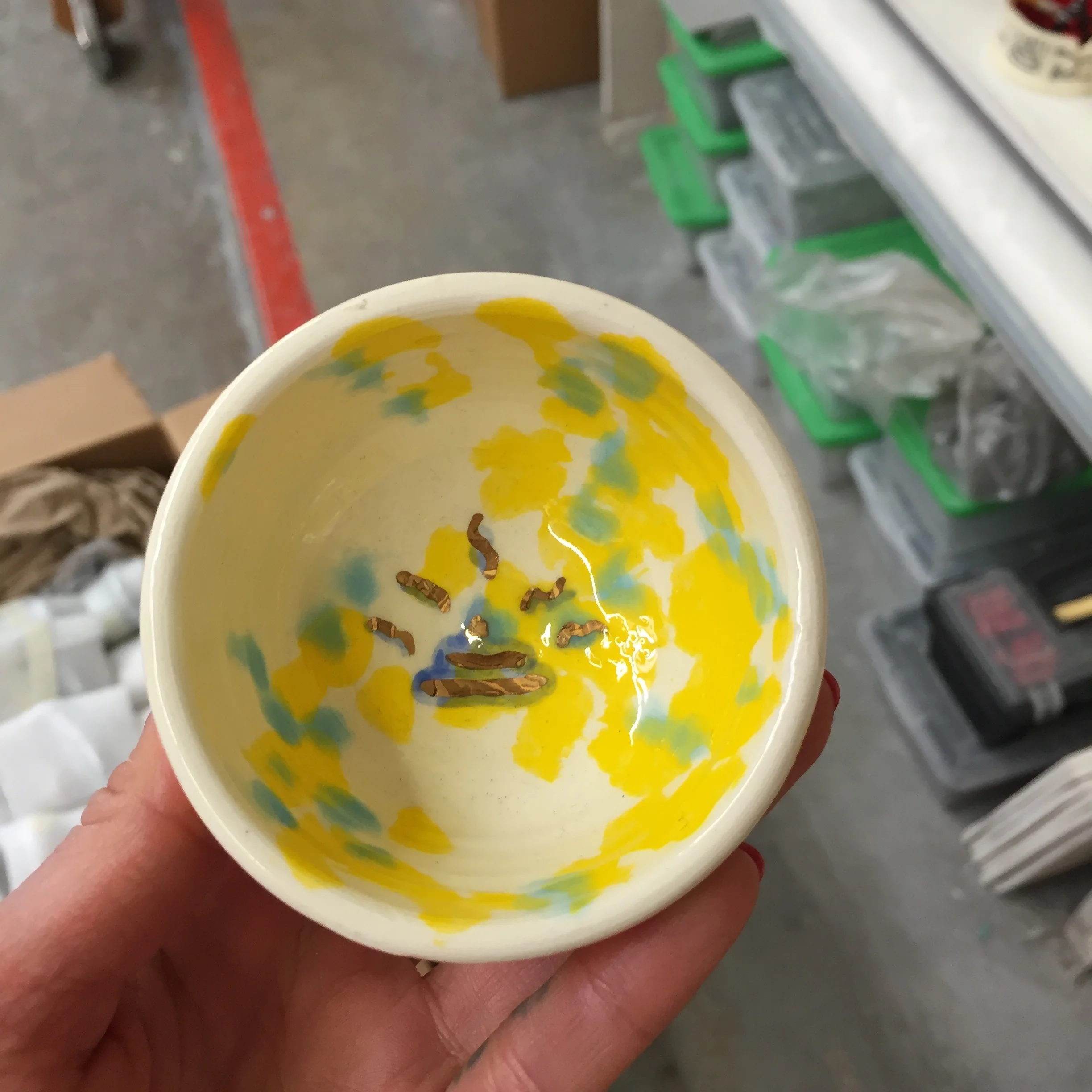 little gold shit bowl