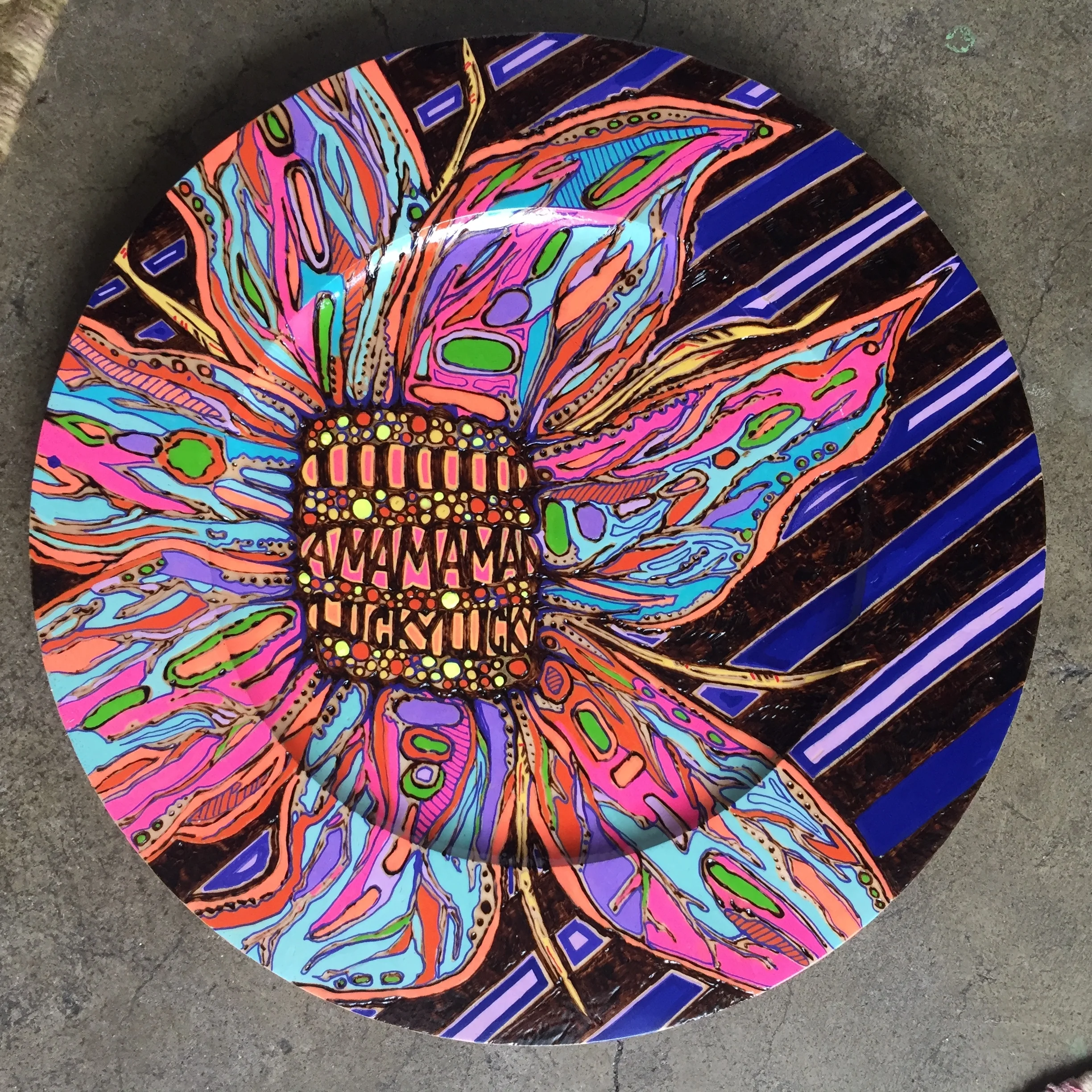  I am Lucky   pyrography and acrylic on birch plate     2016    12’’ 