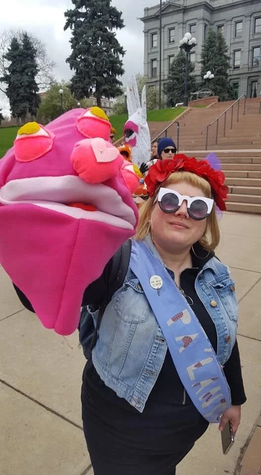  Artist Lares Feliciano holds the puppet head that will eventually become MAMA, as seen in the “Another World is Possible” exhibition. 