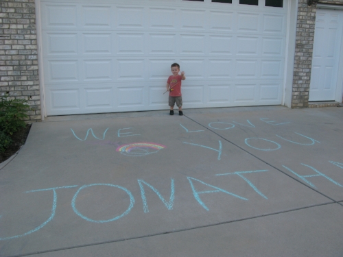 An excited Tyler waiting to welcome his little brother home.