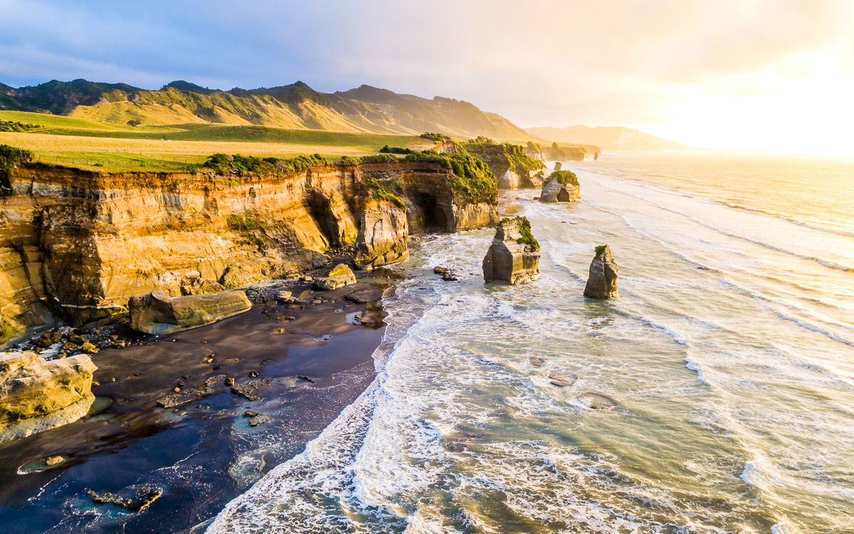 tongaporutu-beach-new-zealand-coast-north-island-nz-new-plymouth-three-sisters-sunset-aerial.jpg