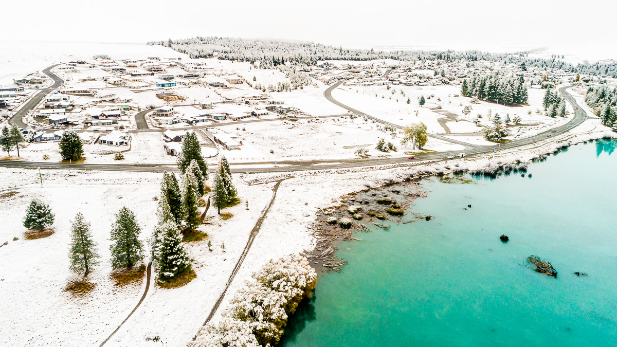 snow-flight-drone-aerial-photography-road-trees-lake-tekapo-snowing-autumn-dji-phantom.jpg