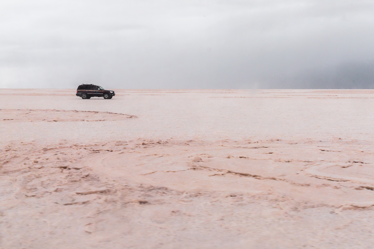 bolivia-bolivian-travel-trip-expedition-salar-de-uyuni-salt-flats-jeep-4x4-wheel-drive-car-vast-landscape.jpg