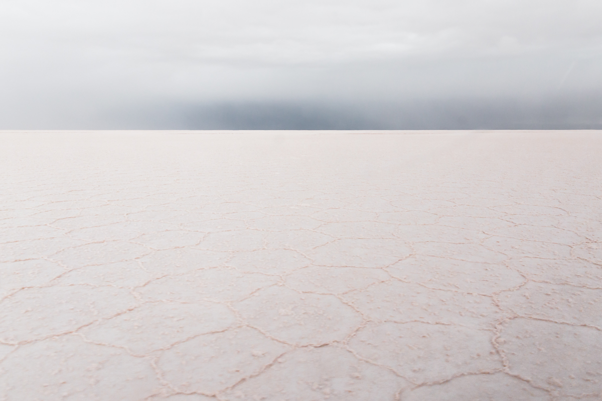 white-salt-flats-salar-de-uyuni-potosi-storm-rain-water-wet-flooded-flat-rainy-grey-cloudy-photography-photos-hexagonal-pattern.jpg