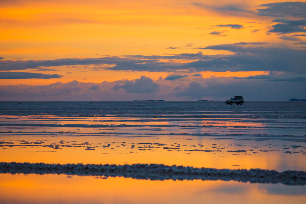 rainy-wet-season-bolivia-salar-de-uyuni-potosi-salt-flats-bolivian-south-america-yellow-orange-evening-dusk-photography-photographer.jpg