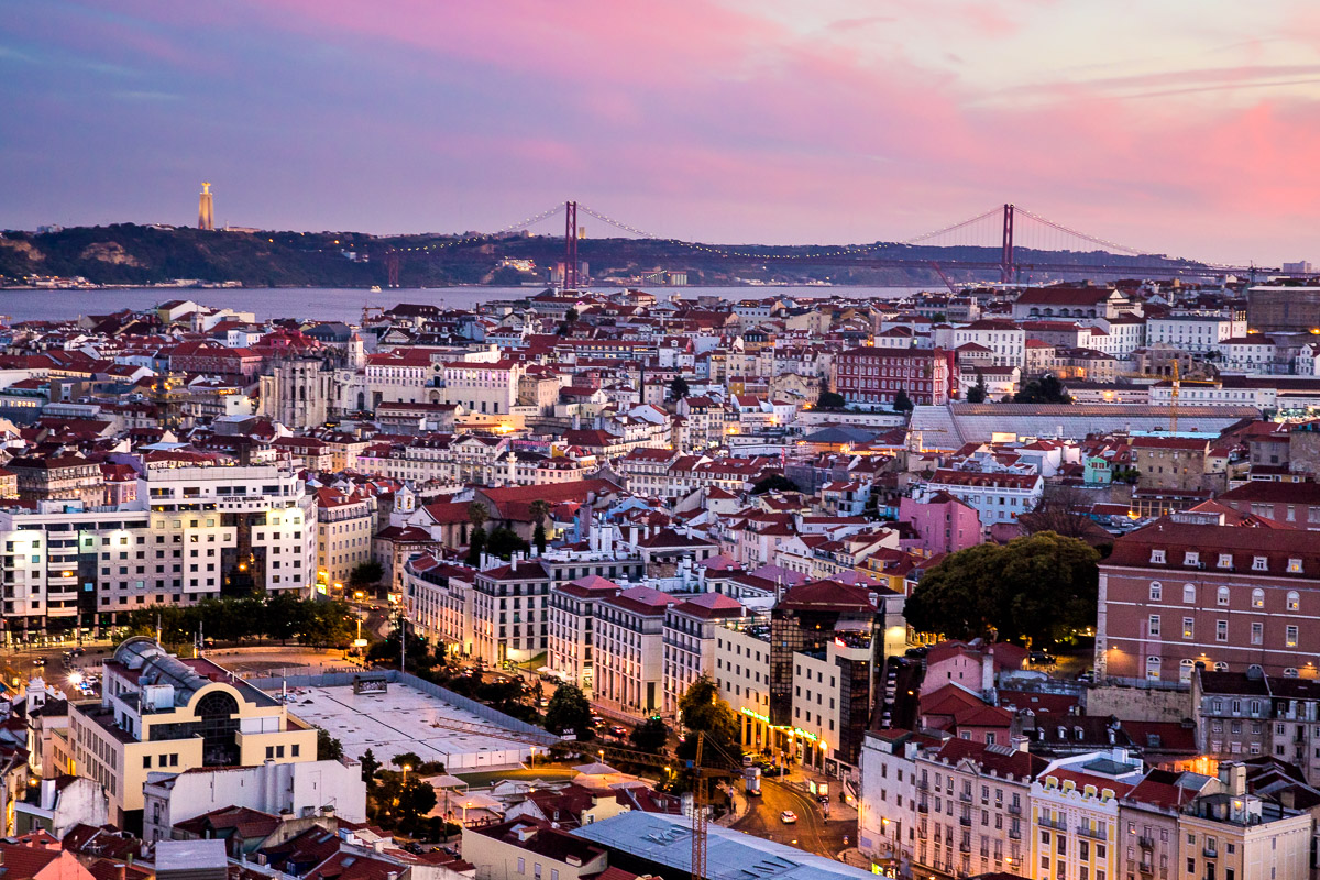 nossa-senhora-do-monte-miradouro-sunset-evening-blue-light-city-lit-up-lisbon-lisboa-portugal-from-above.jpg