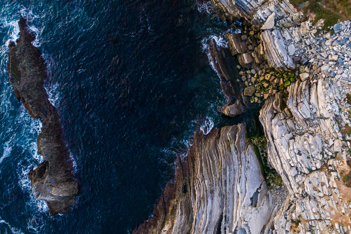 baleal-island-peniche-evening-drone-aerial-birdseye-view-sunset-rock-formation-geographic-photography.jpg