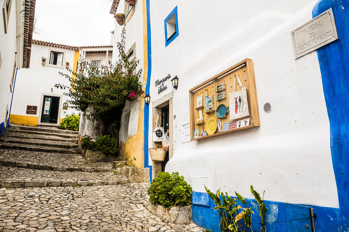 obidos-medieval-town-street-shop-portugal-villages-roadtrip-tour-travel-photographic-trip.jpg