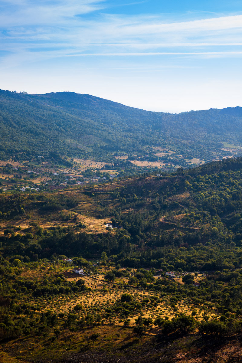 afternoon-light-marvao-city-walk-castle-walls-above-birds-eye-countryside-farms-farmland-portugal.jpg