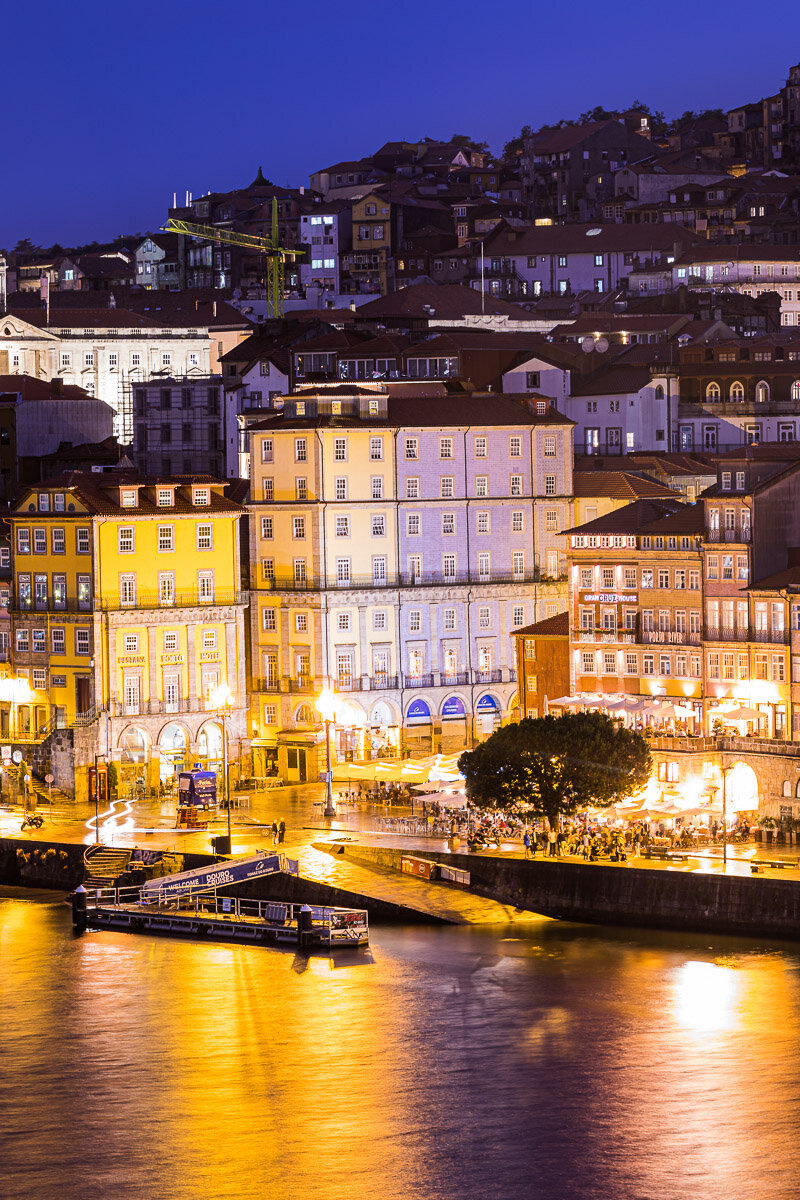 porto-buildings-color-yellow-blue-boats-waterfront-hill-nightlife-evening-dusk-canal.jpg