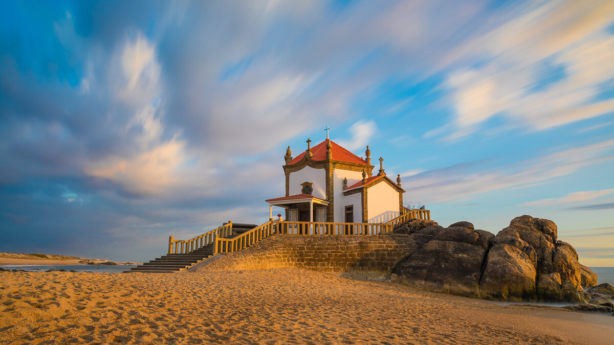 capela-do-senhor-da-pedra-nosso-church-beach-beach-golden-hour-rocks-long-exposure.jpg