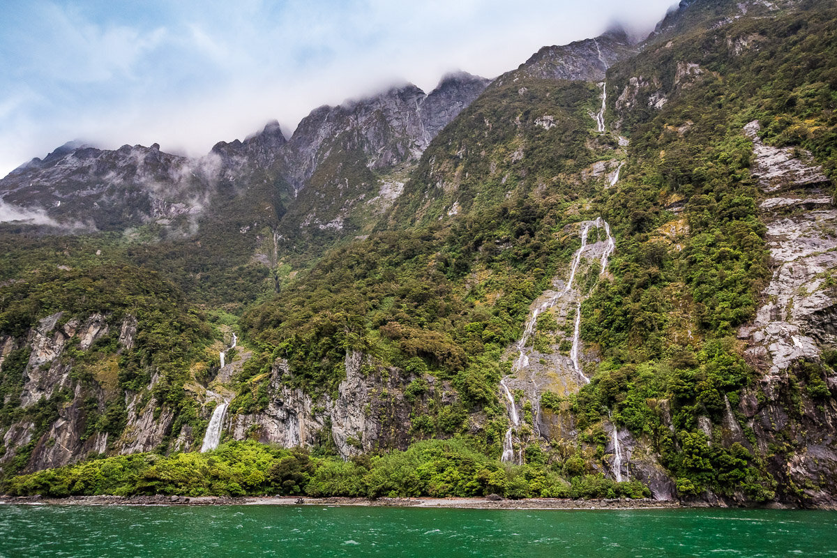 milford-sound-cruise-waterfall-travel-fjord-river-ocean-water-new-zealand.jpg