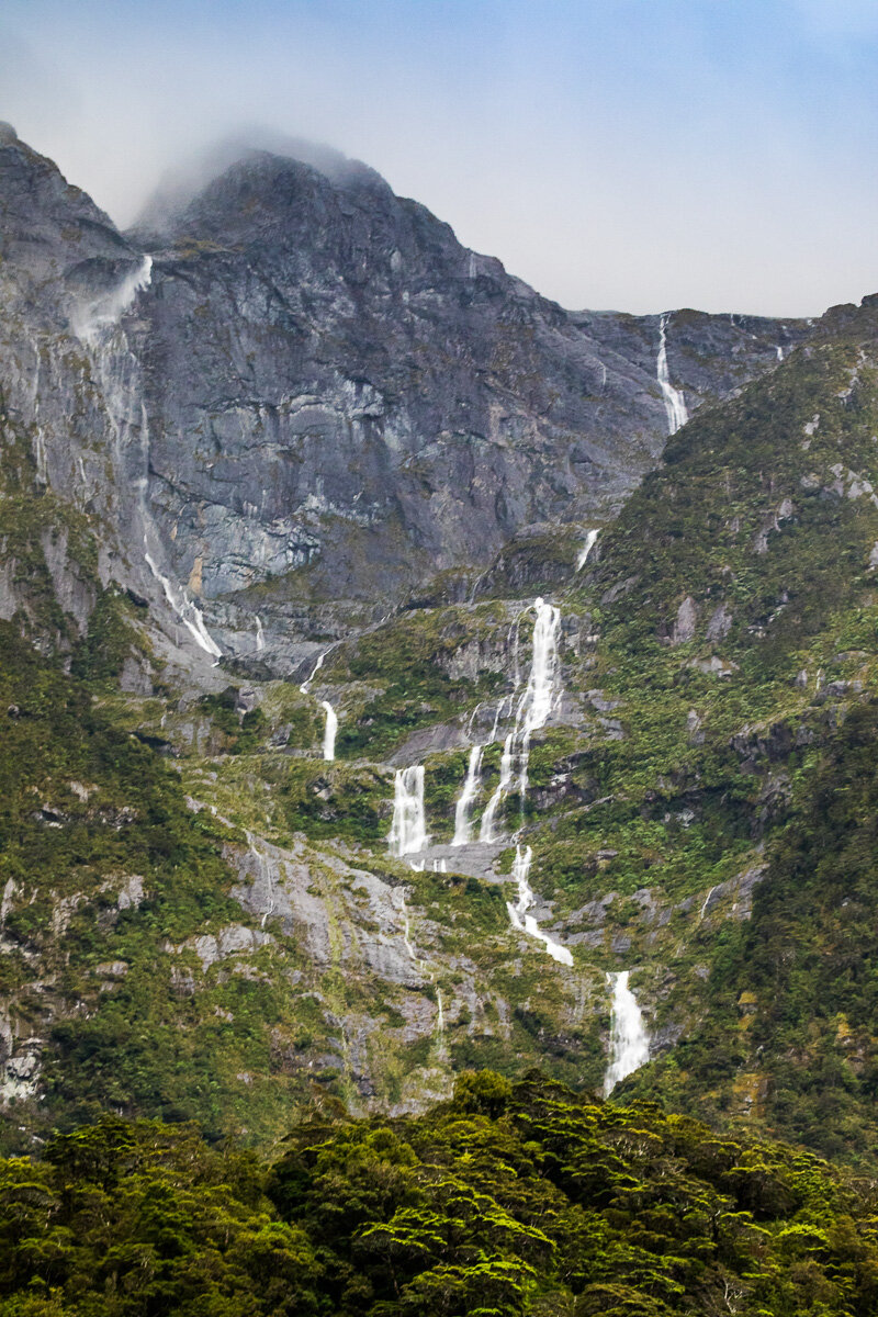 waterfalls-rain-milford-sound-temporary-falls-waterfall-south-island-new-zealand.jpg