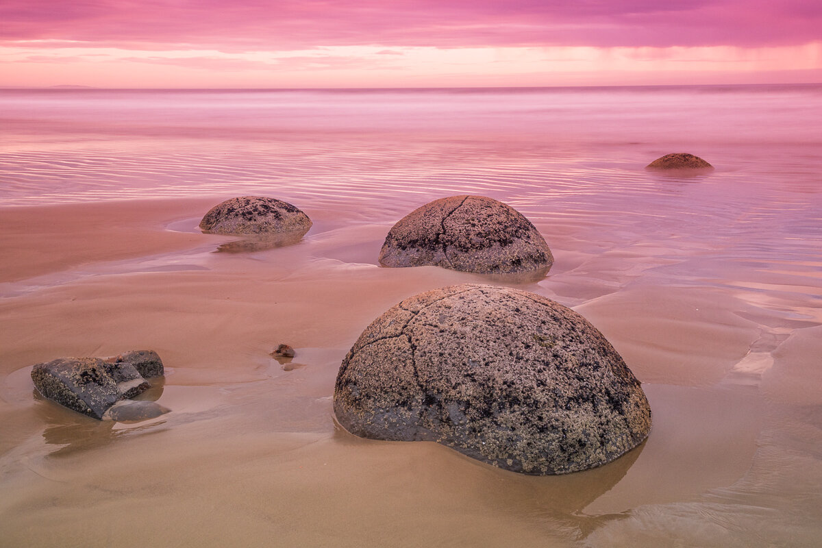 landscape-pink-sunrise-moeraki-boulders-new-zealand-beach.jpg