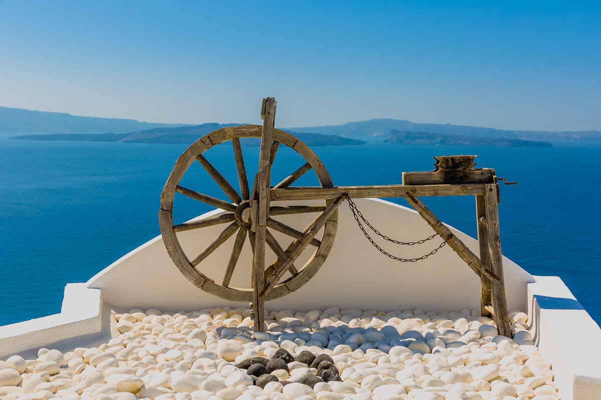 caldera-view-wheel-greece-greek-white-blue-yellow-santorini-colours-detail.jpg