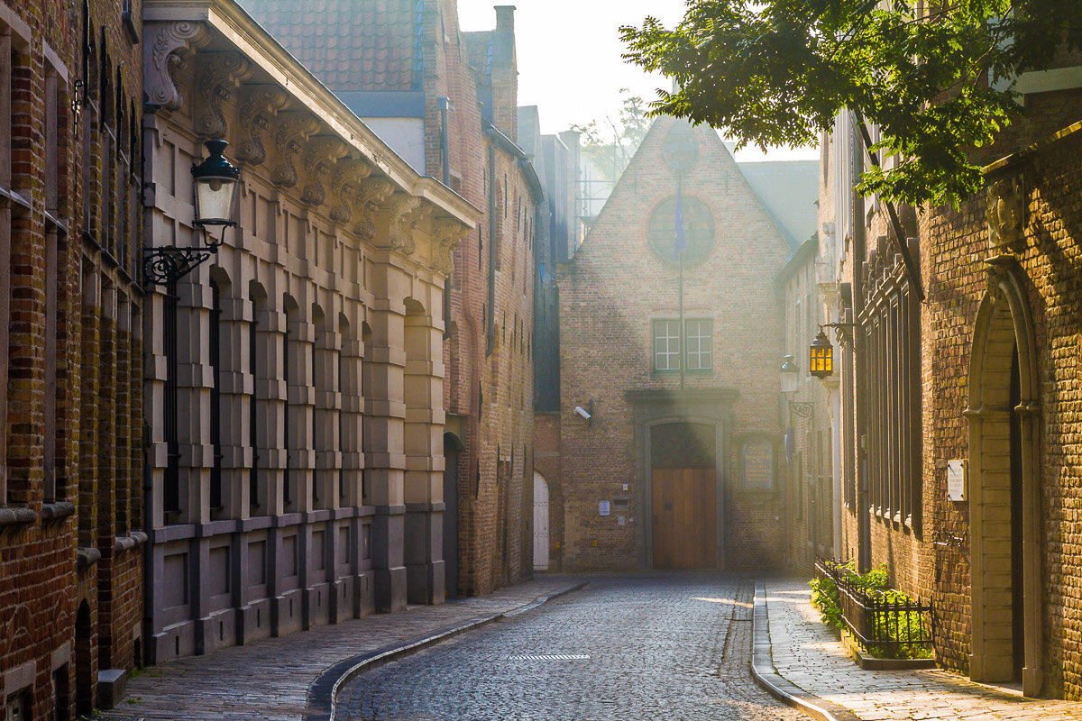 belgium-travel-street-architecture-cobblestone-street-sunrise-light-morning-bruges-ghent.jpg
