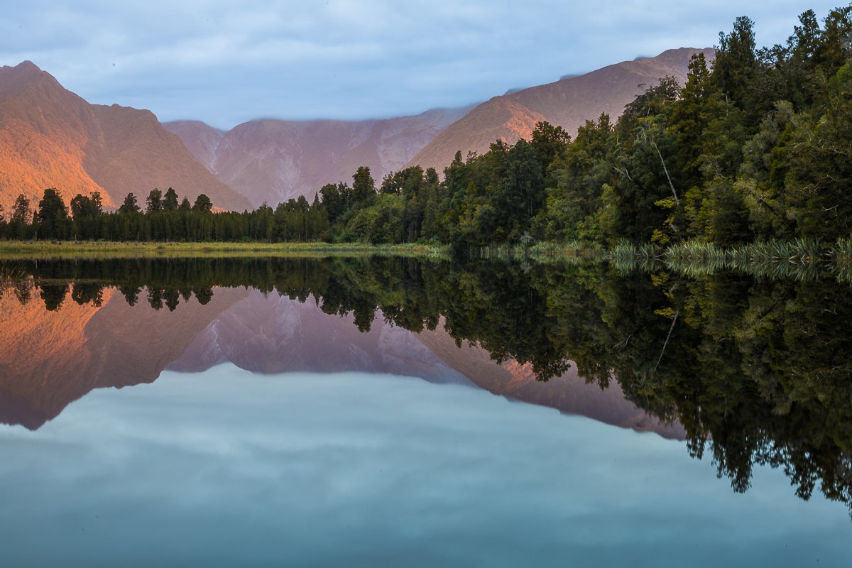 lake-matheson-sunset-reflection-south-island-new-zealand-franz-josef-fiordland-west-coast-NZ-travel.jpg