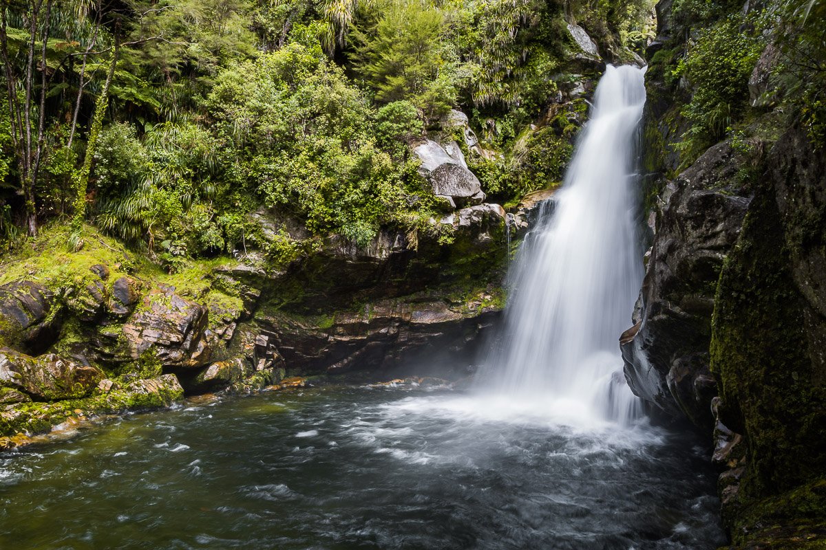 wainui-falls-track-waterfall-pool-forest-nelson-abel-tasman-national-park-new-zealand.jpg