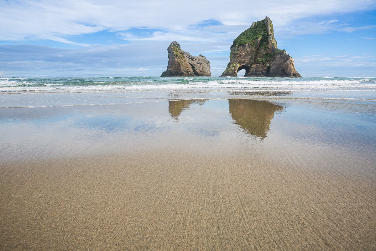 wharariki-beach-arches-new-zealand-south-island-cape-farewell-puponga-coastline.jpg