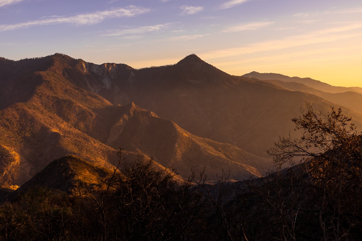 golden-sunset-light-sequoia-national-park-road-silhouette-purple-yellow-orange-photography-landscape-views-travel.jpg