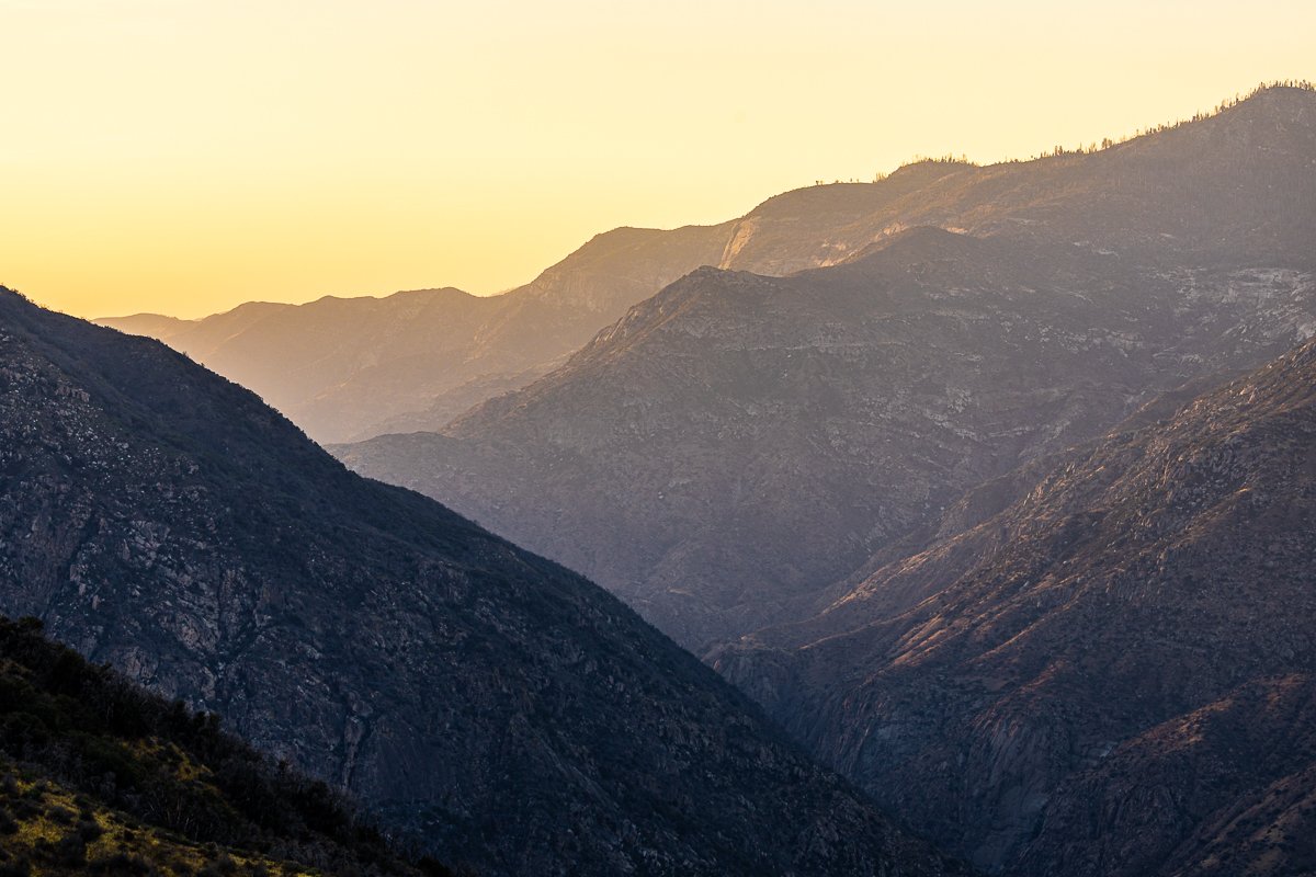 sunset-forest-kings-canyon-national-park-mountain-sides-ridge-valley-silhouette-golden-hour.jpg