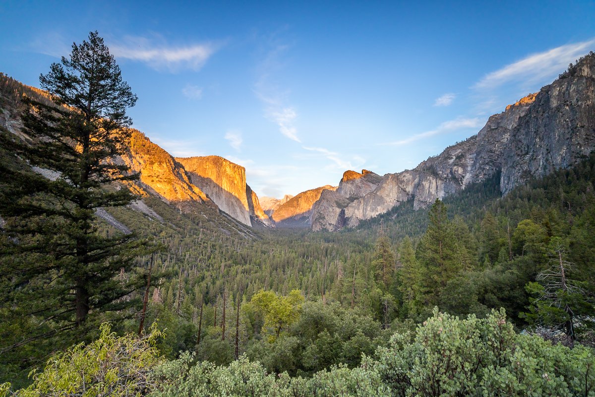 tunnel-view-yosemite-national-park-sunset-orange-light-rocks-cliff-face-mountain-landscape-famous-ansel-adams.jpg