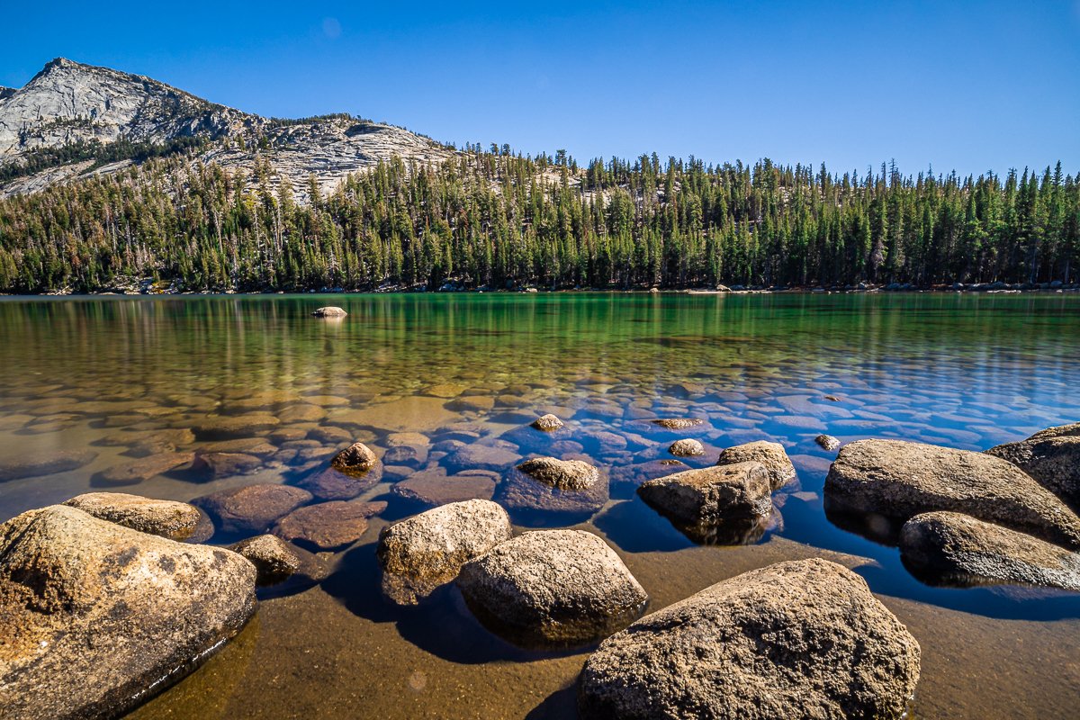 tioga-road-yosemite-national-park-tioga-lake-reflections-rocks-forest-trees-california-autumn-fall-october-travel.jpg