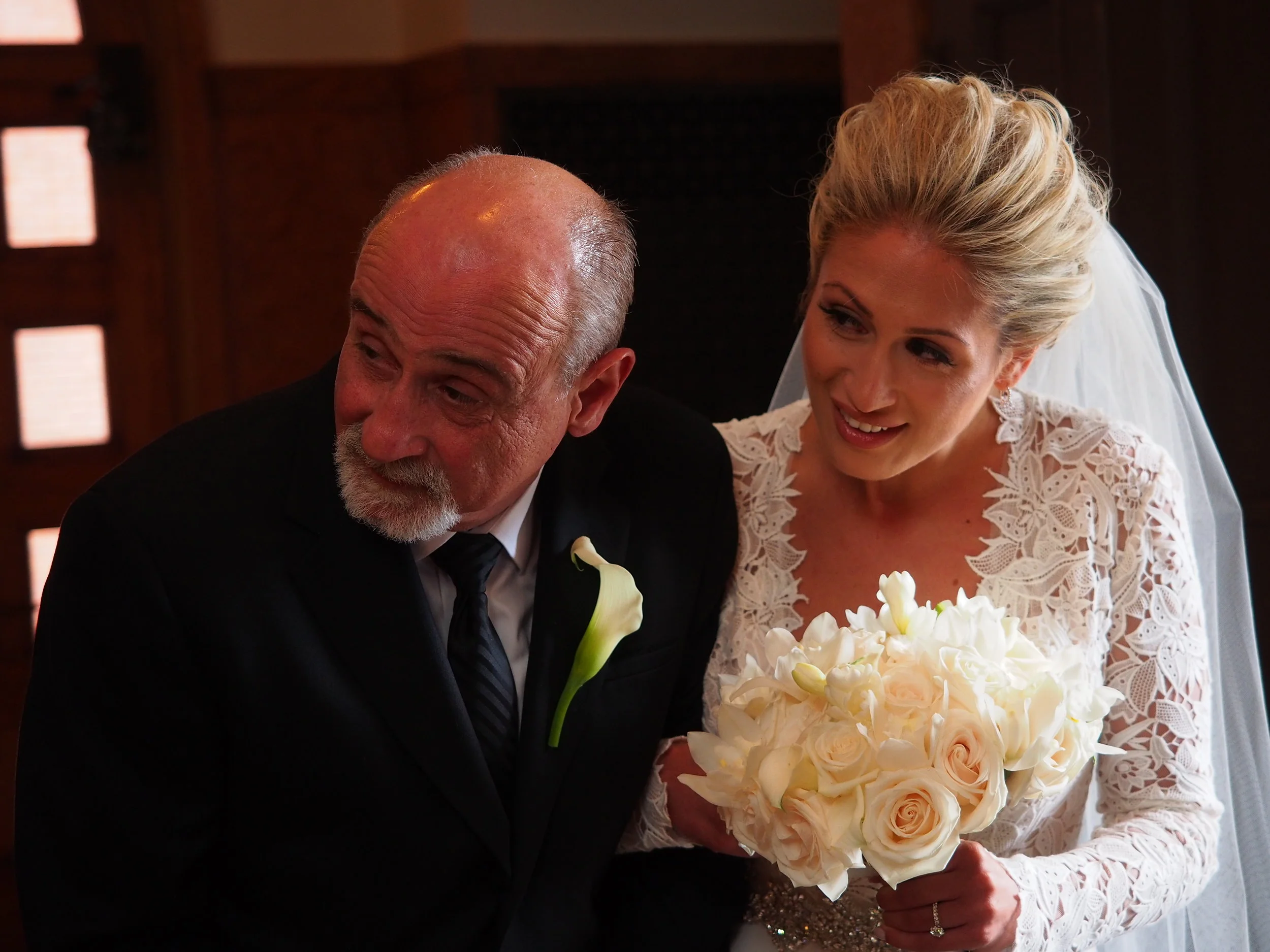 Daddy about to walk his beautiful daughter down the wedding aisle.