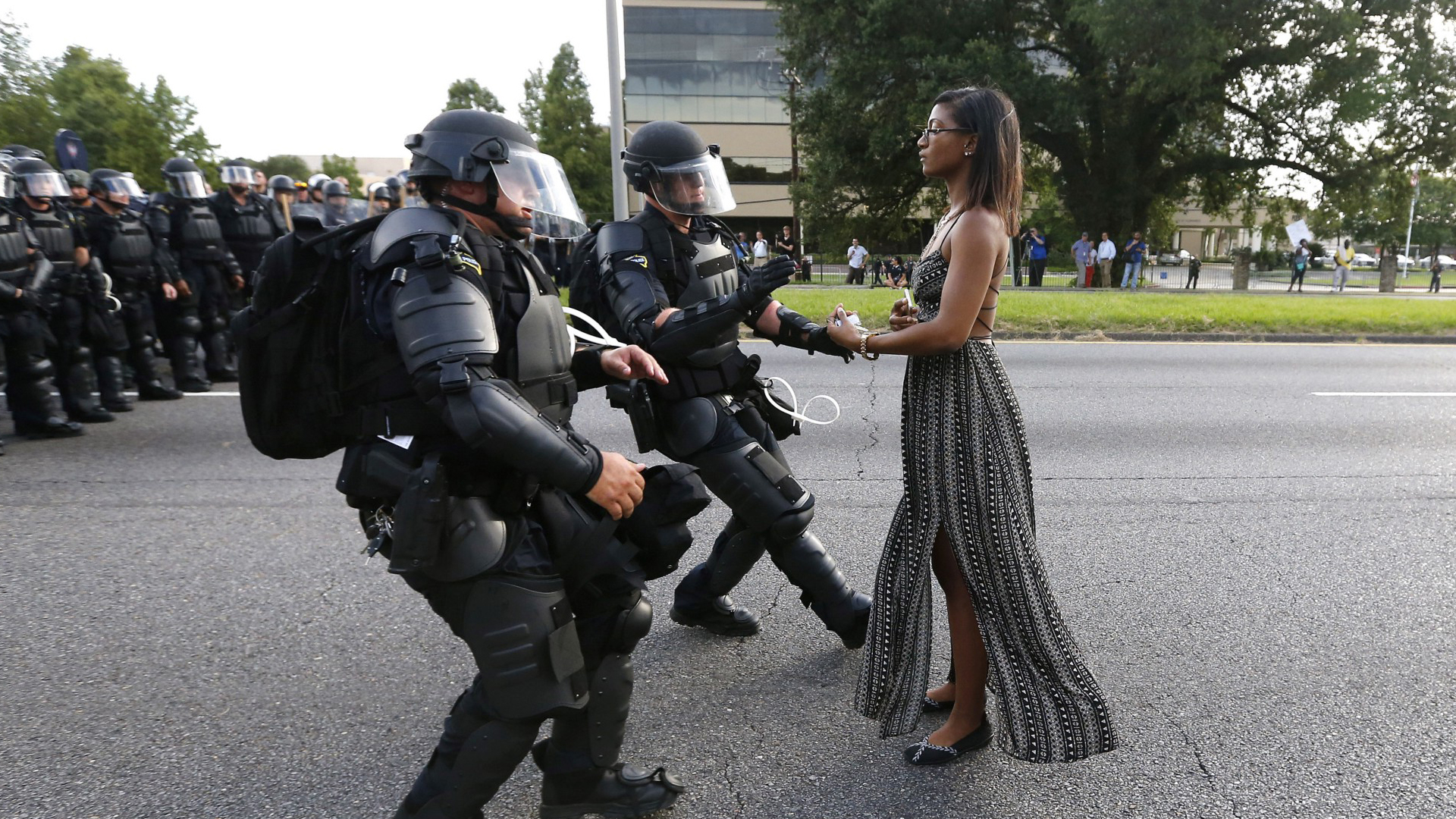 Black Lives Matter protest USA. Baton Rouge, Louisiana. 9 July 2016. Ieshia Evans, 28-year-old mum and nurse from Brooklyn, is arrested during a protest outside the city’s police headquarters. The protest were sparked by the death of Alton Sterling, a black man who was shot several times at close range while being held down on the ground by two white police officers. (Photo: Jonathan Bachman/REUTERS)